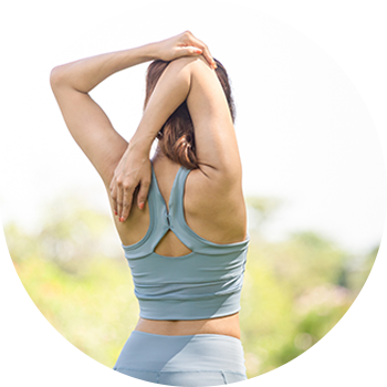 Woman stretching shoulder Woman stretching shoulder