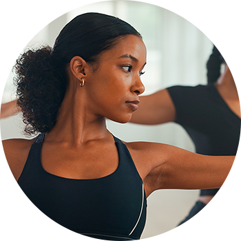 Woman stretching shoulder Woman stretching shoulder